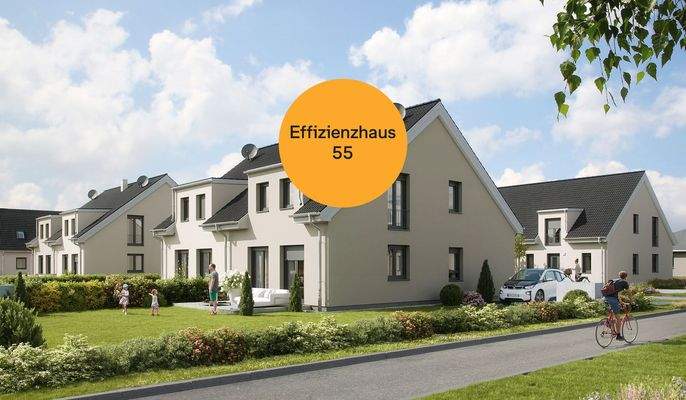 Das Doppelhaus in seiner grünen Umgebung