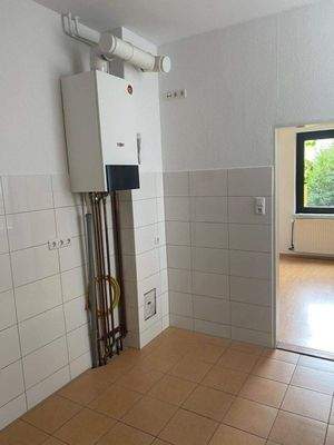 Küche mit Blick in das Wohnzimmer