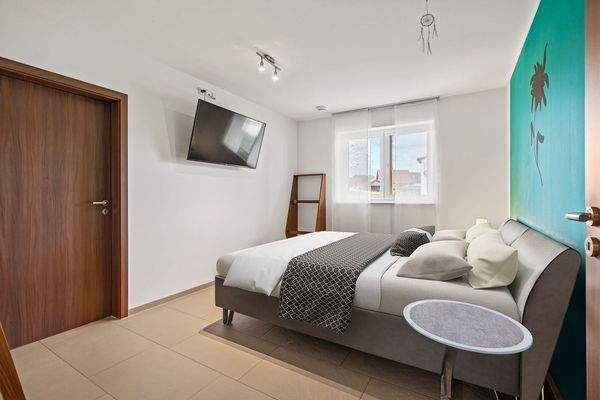 EG Schlafzimmer 1 mit Ankleide