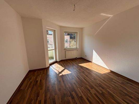 Schlafzimmer mit Balkonzugang