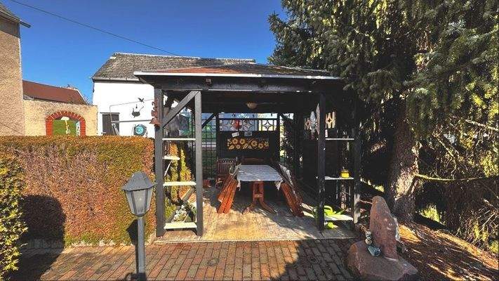 Sitzecke vor dem Haus