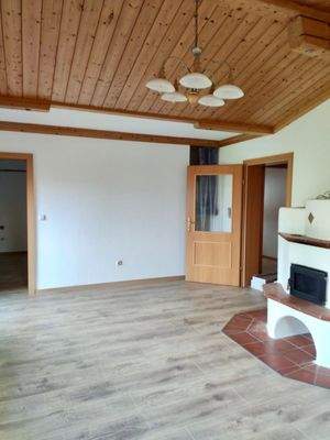 Wohnzimmer Top 1 DG mit Kachelofen