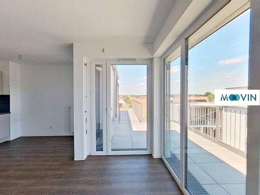 Ansicht I: Wohn- und Esszimmer mit offenem Küchenbereich