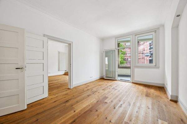 Schlafzimmer mit Balkonzugang