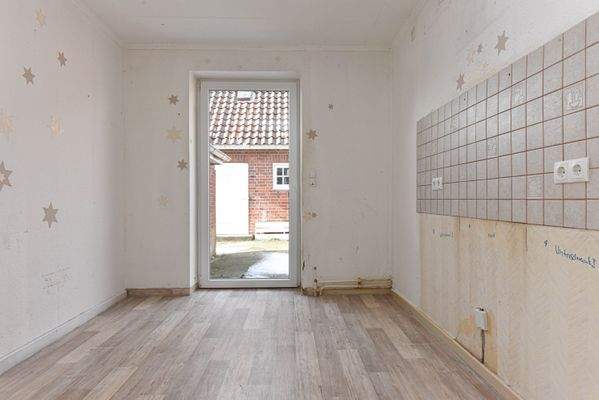 Küche mit Zugang zur Westterrasse 