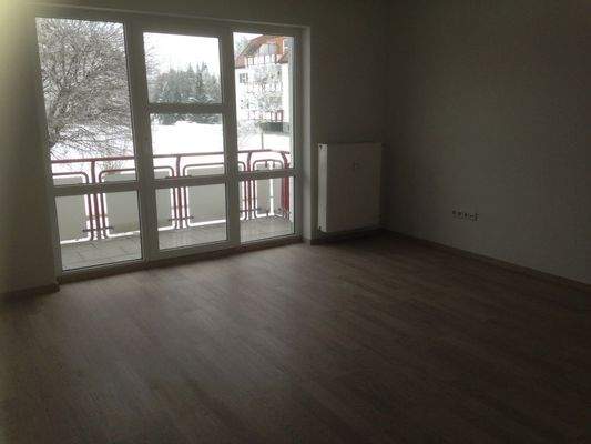 Wohnzimmer mit Balkon