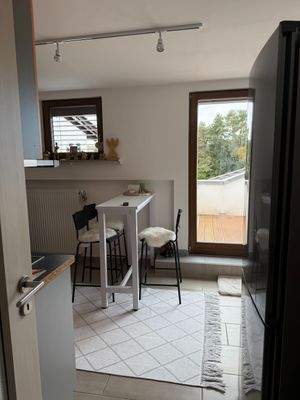 Essbereich mit Zugang zum Balkon