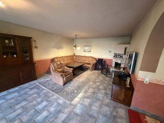 Wohnzimmer mit Kamin