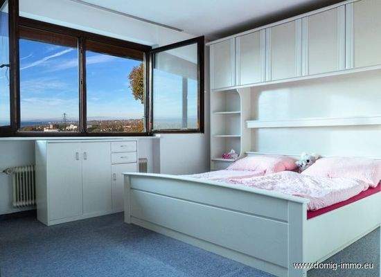 Schlafzimmer mit Seeblick