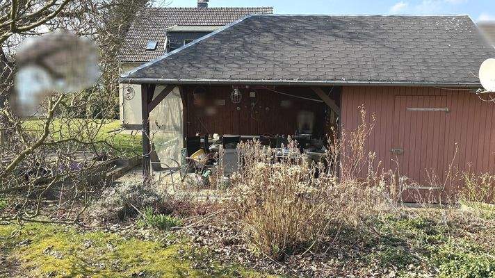 überdachte Gartenterrasse