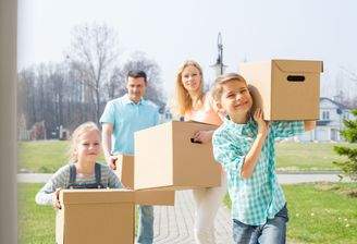 bigstock-Family-with-cardboard-boxes-mo-92262542.j