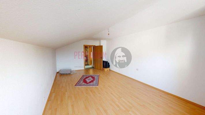 Schlafzimmer 2 im 1. OG