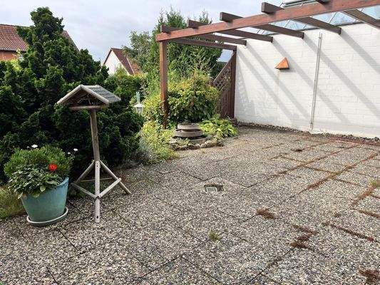 Terrasse mit Pergola am Wintergarten