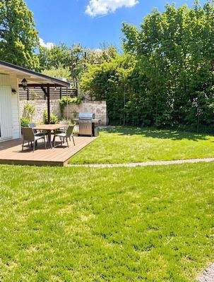 Garten nach hinten - (KI generiert)