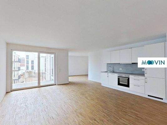 Ansicht II: Wohn- und Esszimmer mit offenem Küchenbereich