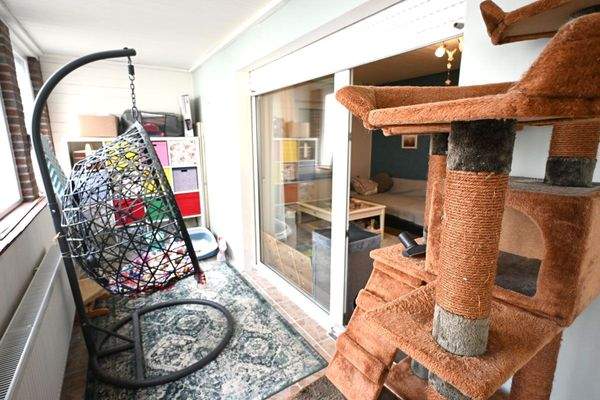 im EG mit kleinem Wintergarten