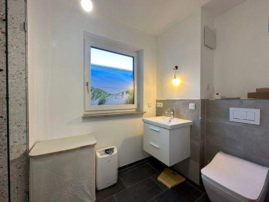 Bad mit Dusche und Dusch-WC