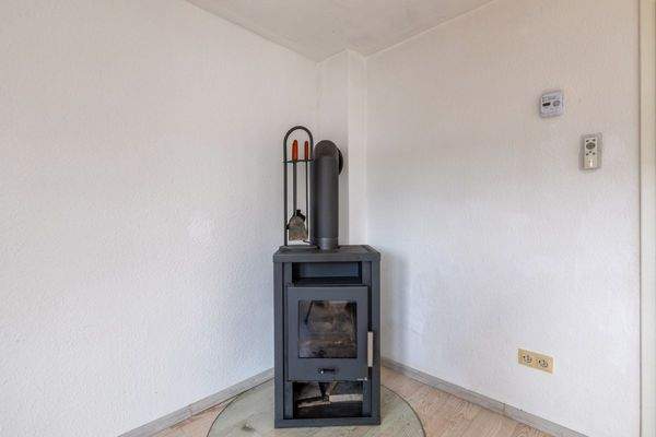 1.OG: Kamin in Zimmer 1