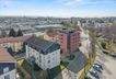 Ansicht Haus mit Umgebungsbebauung