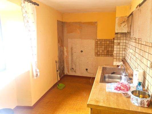 Küche mit angrenzendem Esszimmer