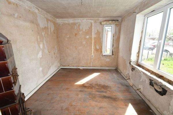 Zimmer mit Kachelofen