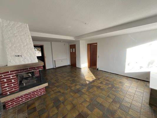 Wohnzimmer mit Kamin