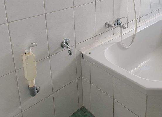 Waschmaschinenanschluss im Bad