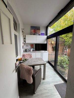 Wintergarten im EG mit Zugang zum Garten