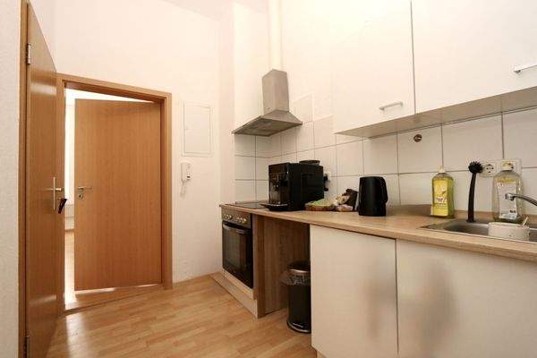 mit funktionaler Küche im Flur