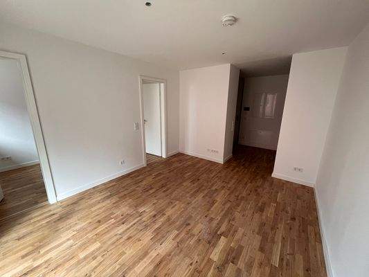 Wohnzimmer mit Holzboden