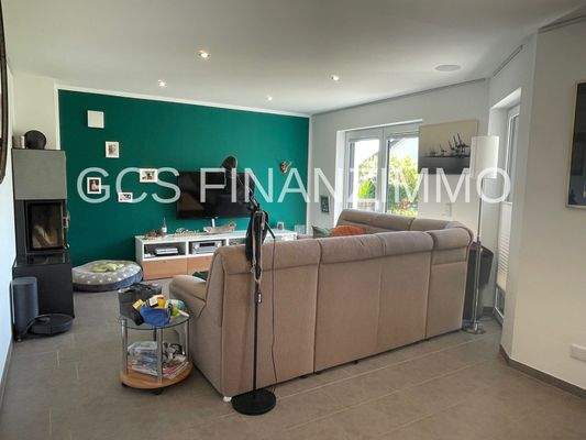 Wohnzimmer mit Kamin UG