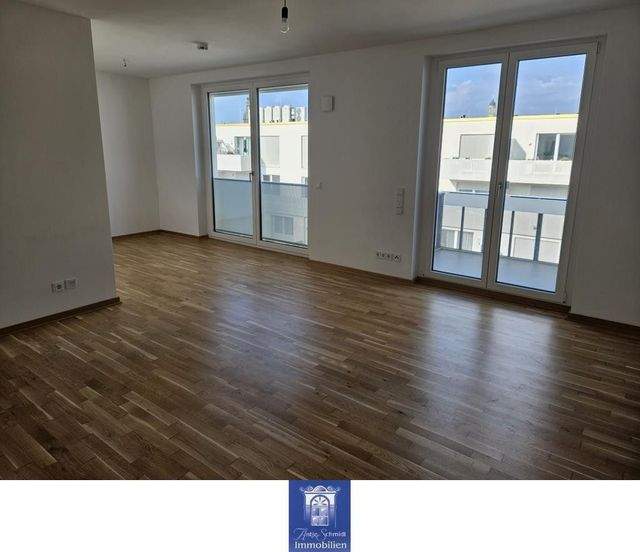 Wohntraum mit schönem Balkon, hochwertiger EBK und exklusivem Bad! - Photo 2
