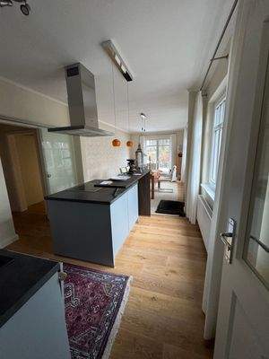 Wohnzimmer mit Küche in Einheit II