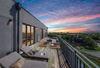Dachterrasse mit Sonnenuntergang
