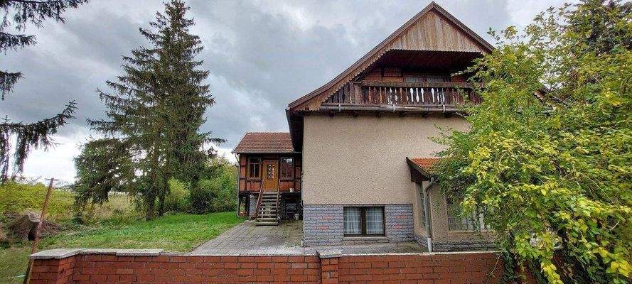 Balkon und Kaminzimmer außen