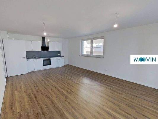 Ansicht III: Wohn- und Esszimmer mit offenem Küchenbereich