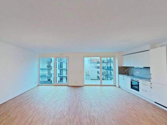 Ansicht I: Wohn- und Esszimmer mit offenem Küchenbereich