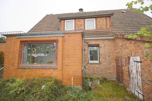 Abrissobjekt auf Baugrundstück