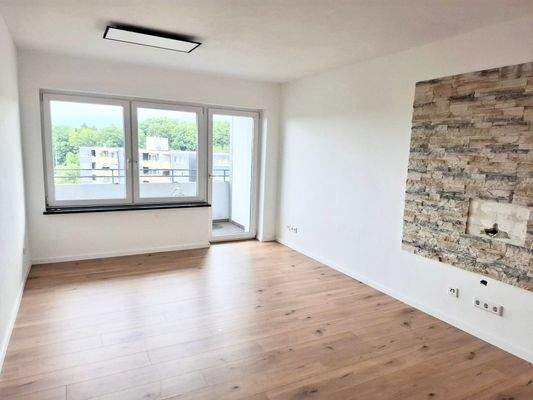 Wohnzimmer mit Balkon