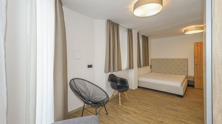 KITZIMMO-Garten Apartment mit touristischer Widmung kaufen - Immobilien Kitzbühel.