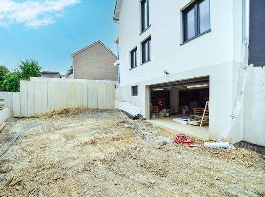 Zufahrt TG & Außenstellplätze