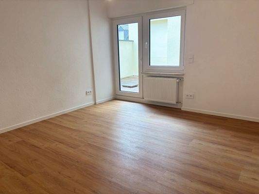 Schlafzimmer mit Zugang zur Terrasse