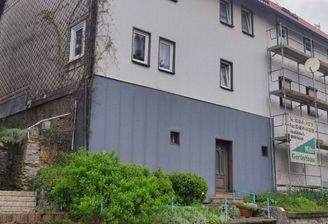 Außenansicht mit Hintertür