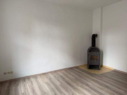 Wohnzimmer mit Kamin