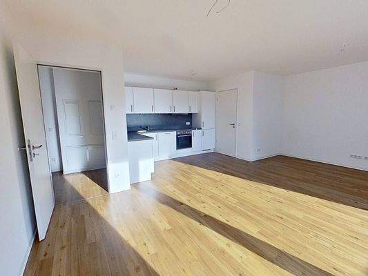 Ansicht IV: Wohn- und Esszimmer mit offenem Küchenbereich