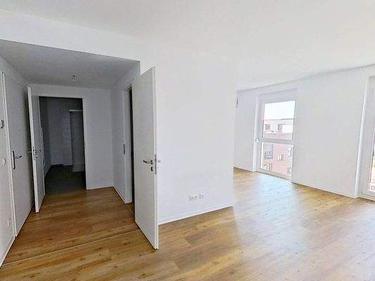 Ansicht V: Wohn- und Esszimmer mit offenem Küchenbereich