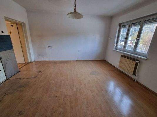 Im EG :Wohnküche,Wonhnzimmer, Zimmer,Bad,Toilette,