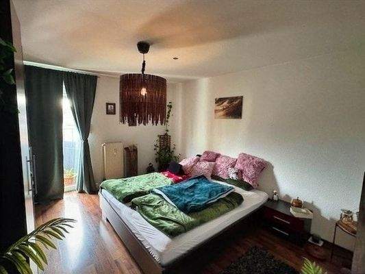 Schlafen mit angrenzendem Balkon