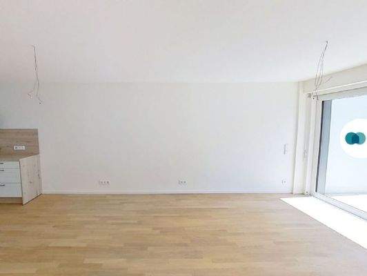 Ansicht II: Wohn- und Esszimmer mit offener Küche