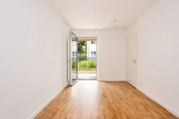 Schlafzimmer mit Zugang zur Terrasse